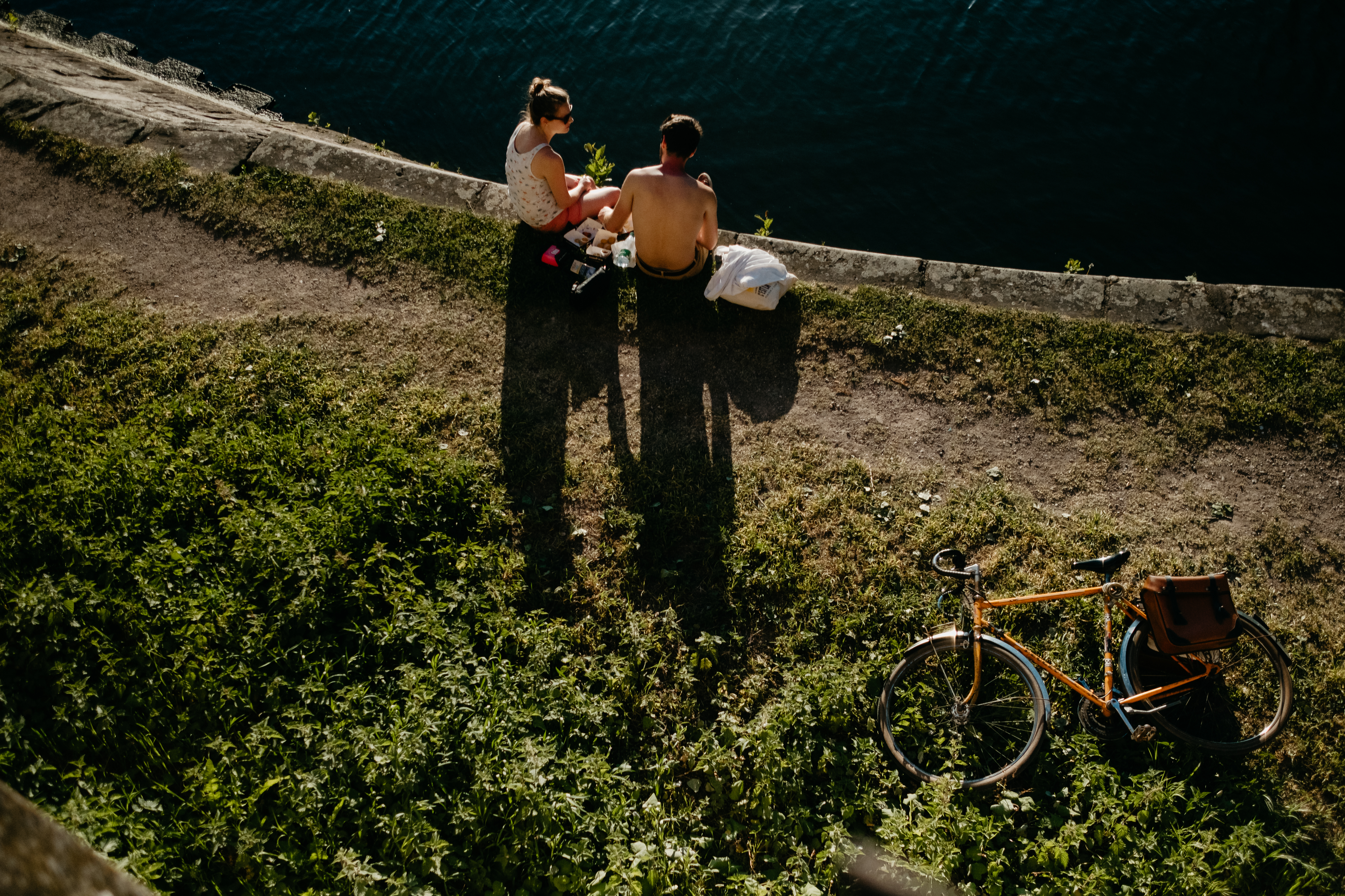 A couple enjoys dinner on the Rhine River in Strasbourg, France.
